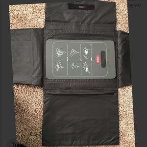 Tumi folding board case.
